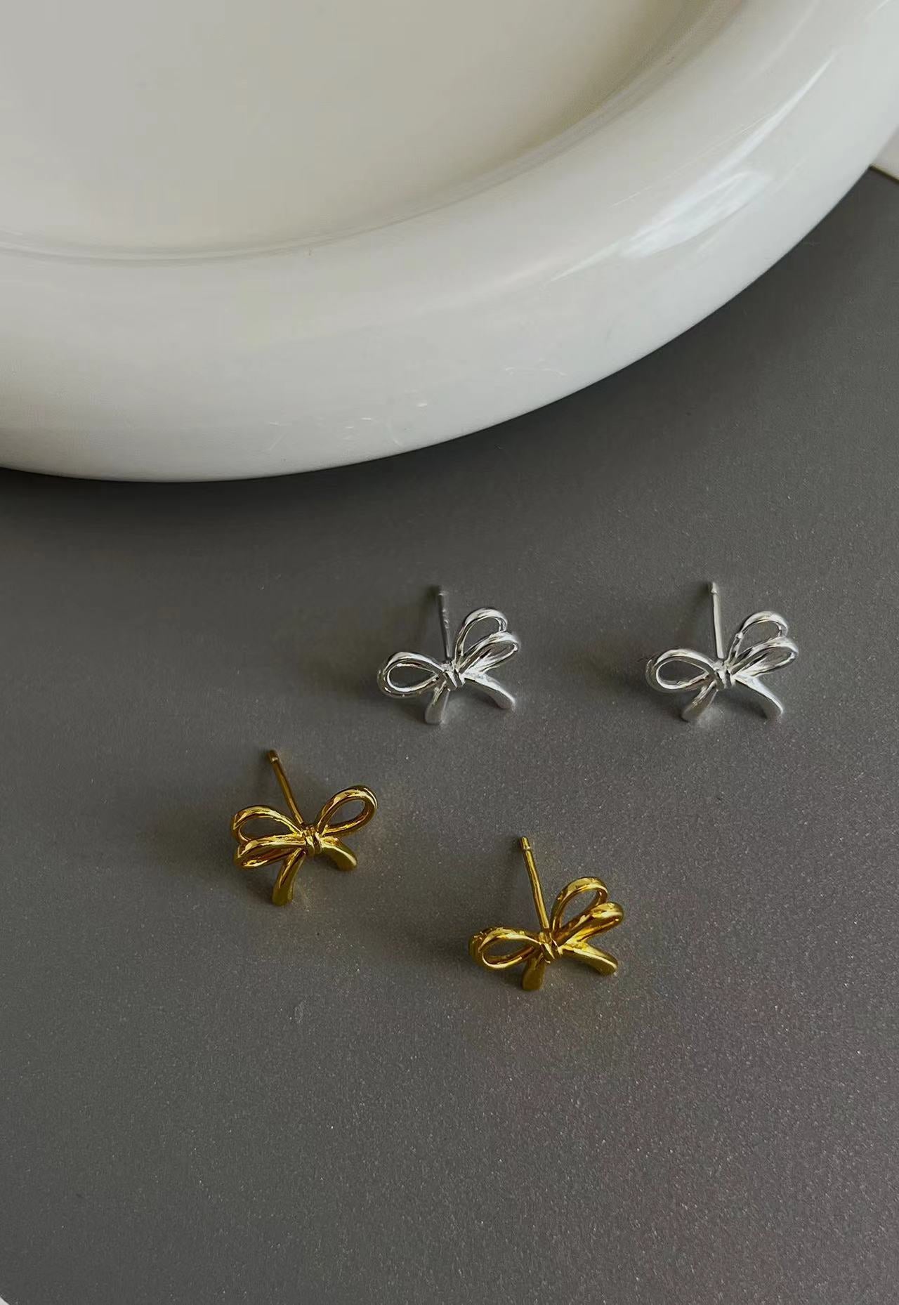 925 silver bow cut-out earrings
