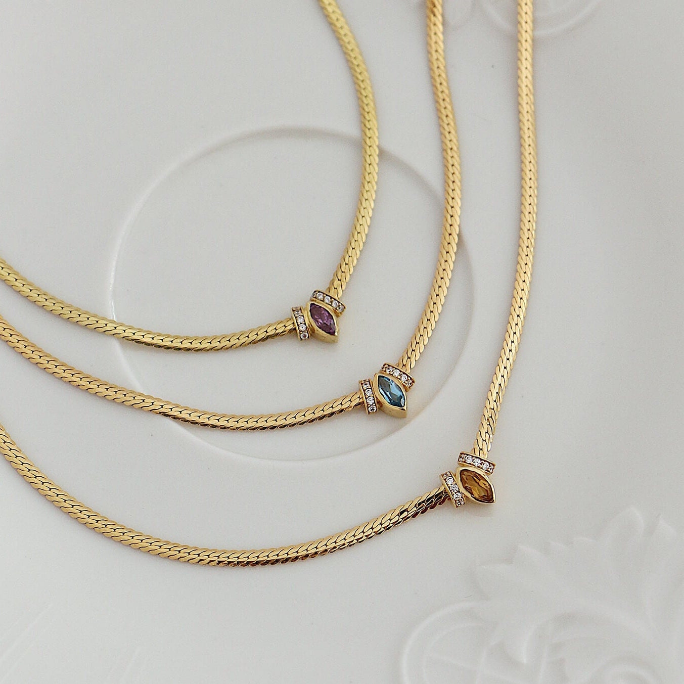 Stainless steel horse eye snake bone necklace