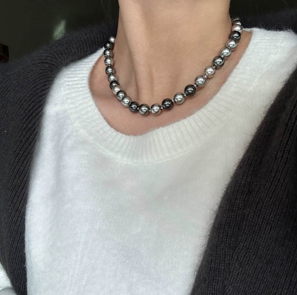 Necklace of faux melange gray-green pearls