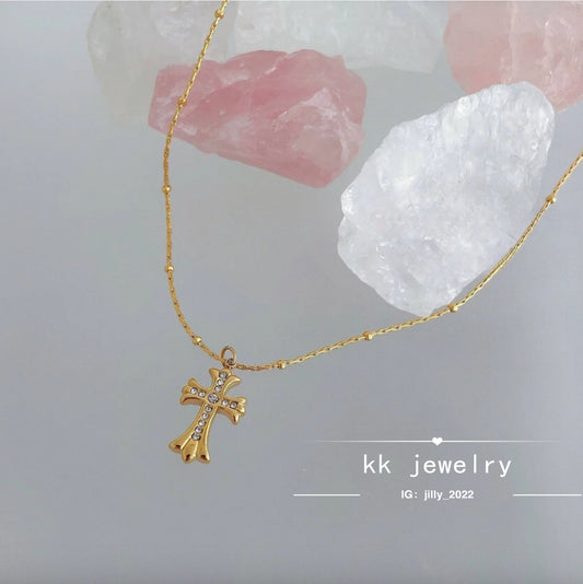 Golden cross necklace