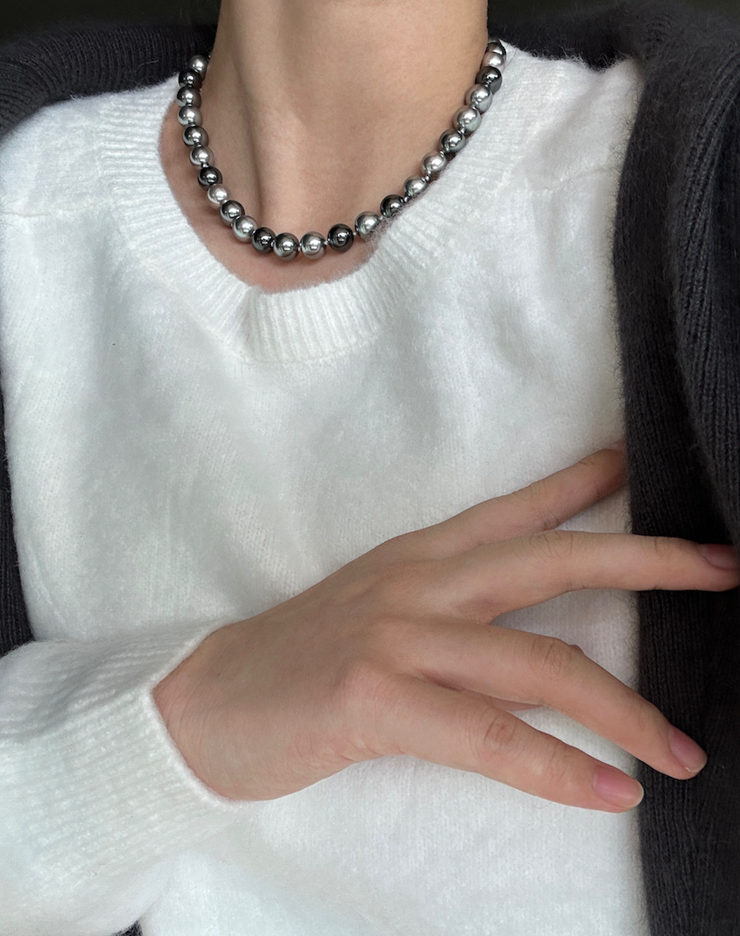 Necklace of faux melange gray-green pearls