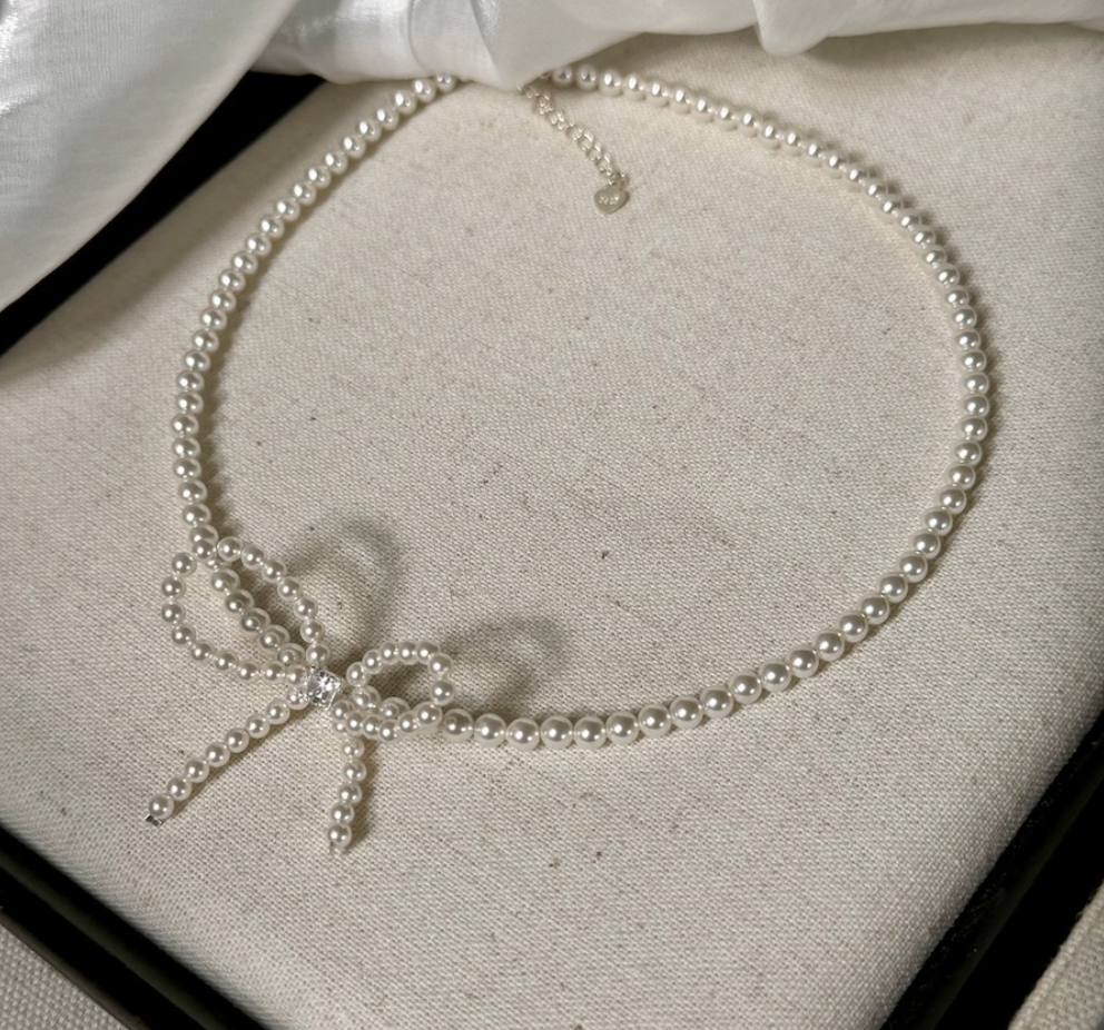 Sterling silver bow faux pearl gentle necklace