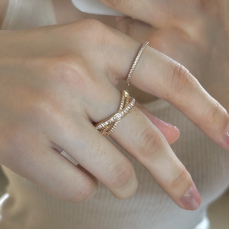 Cross-wrapped gold rings