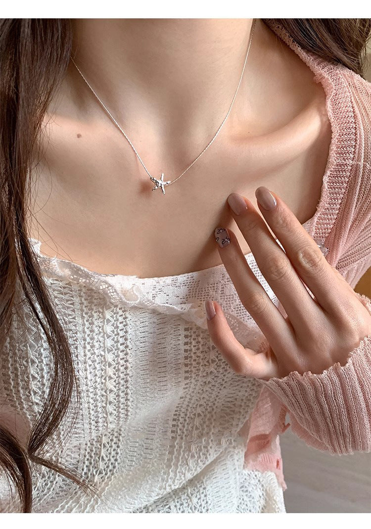 925 silver textured lava starfish necklace