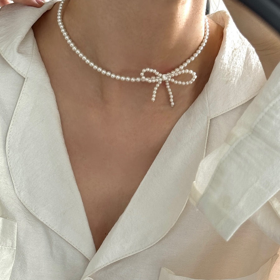 Sterling silver bow faux pearl gentle necklace