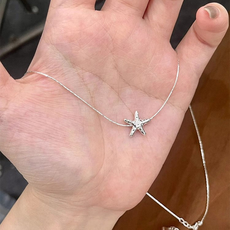 925 silver textured lava starfish necklace