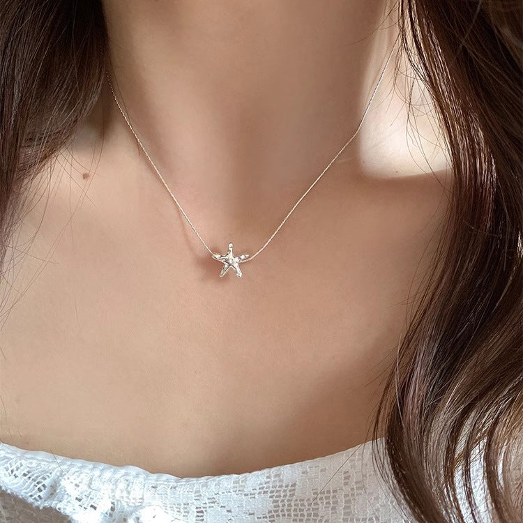 925 silver textured lava starfish necklace