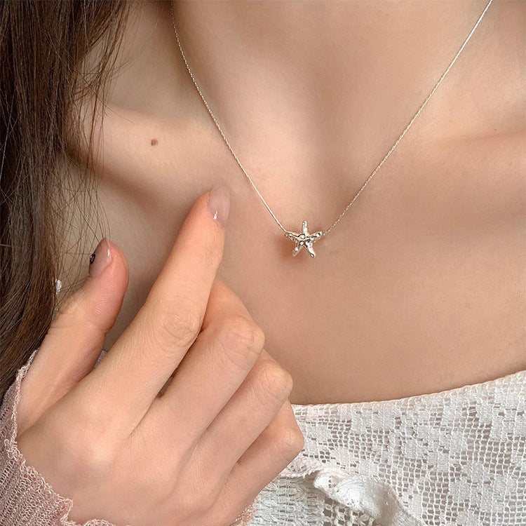 925 silver textured lava starfish necklace