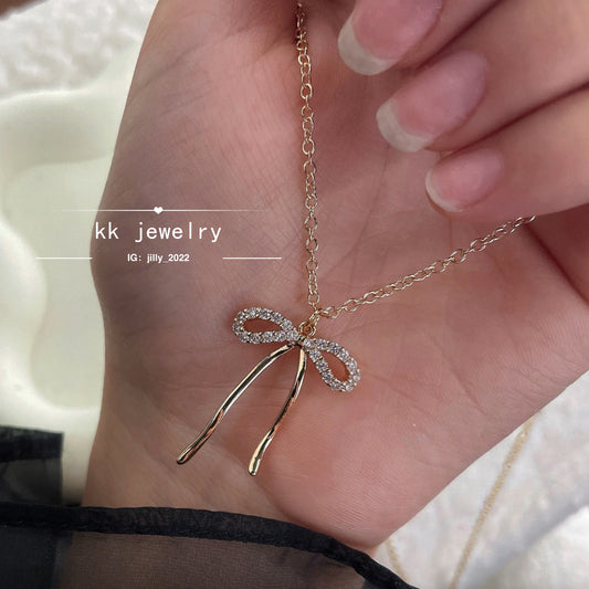 Stainless steel bow necklace